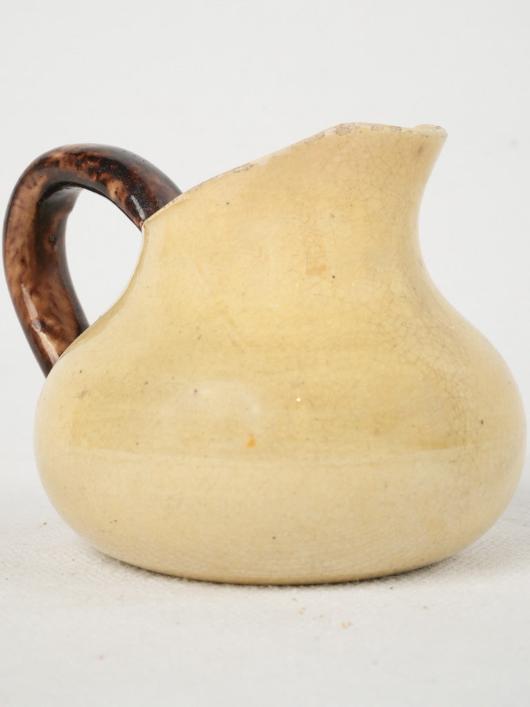 Vintage antique yellow-brown glazed sauce pitcher