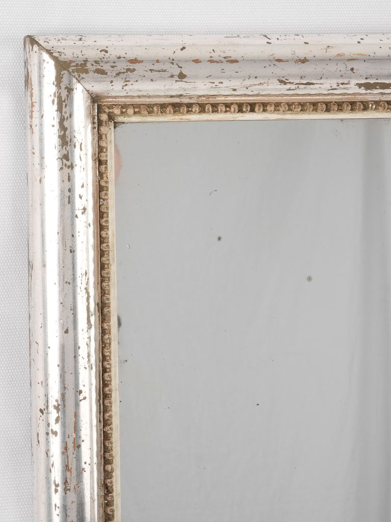 Traditional style silver-framed bistro mirror