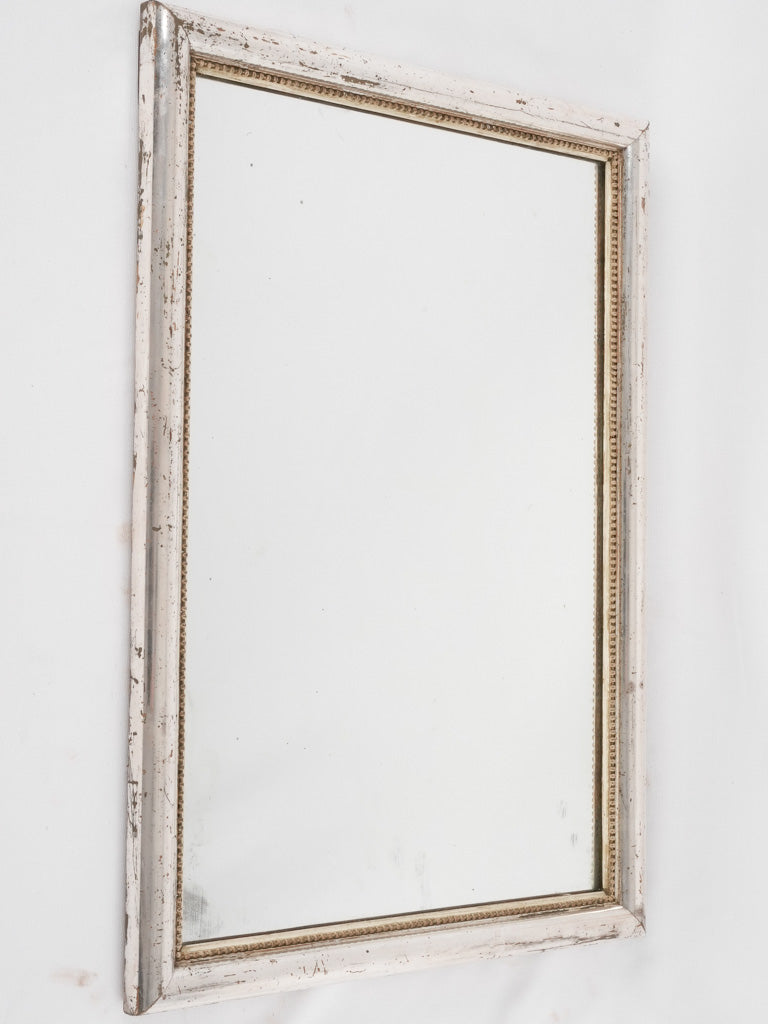 Elegant beaded edge bistro mirror