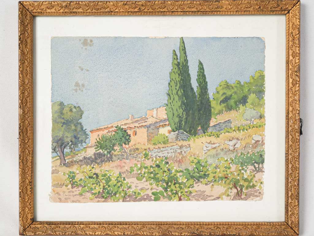 Ornate gilt-framed watercolor