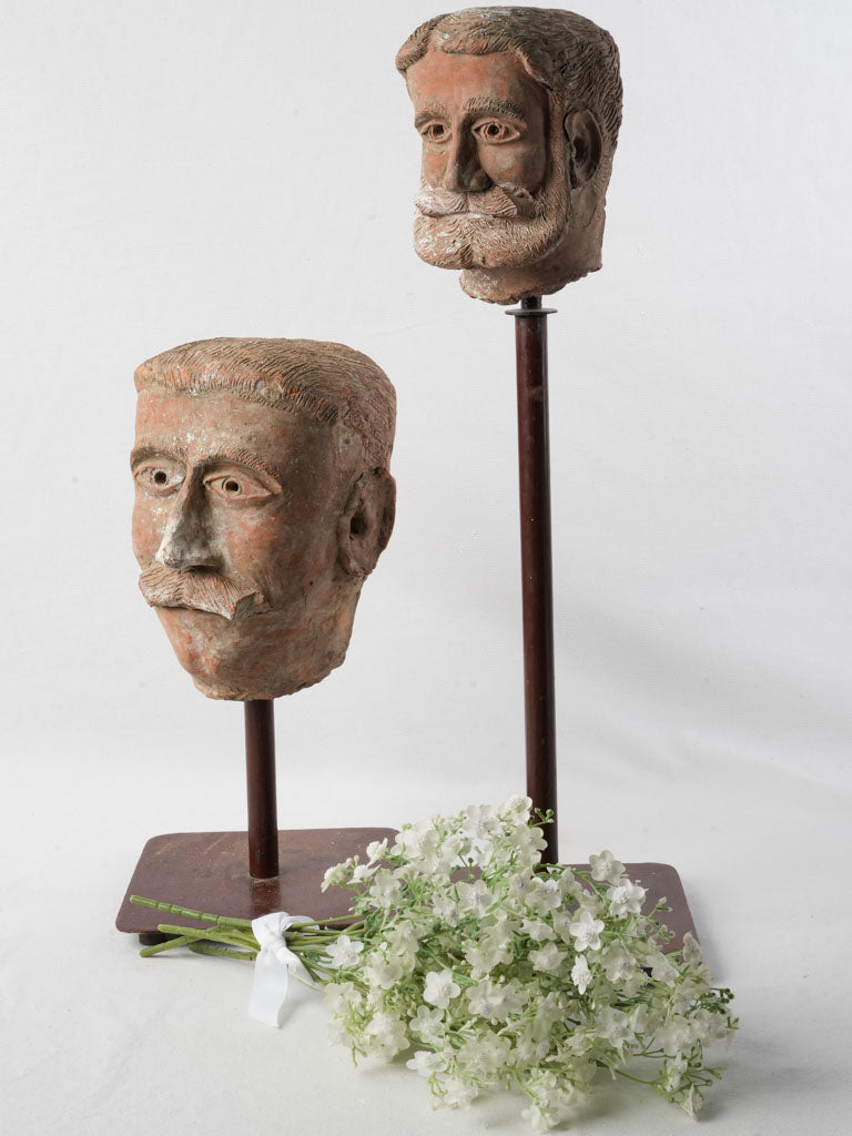 Vintage male head sculptures
