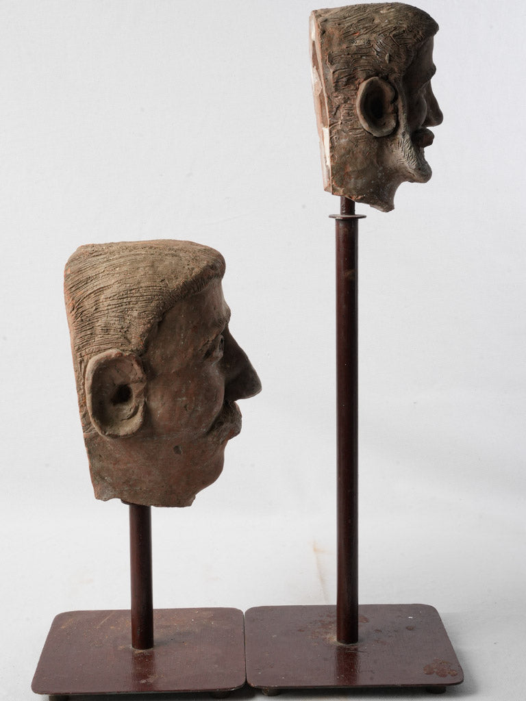 Intricate terracotta male heads