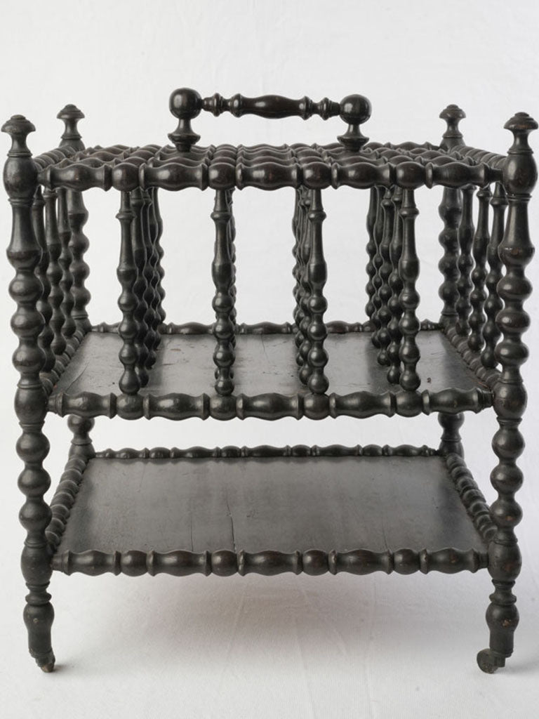 Stylish ebonised bobbin-turned canterbury