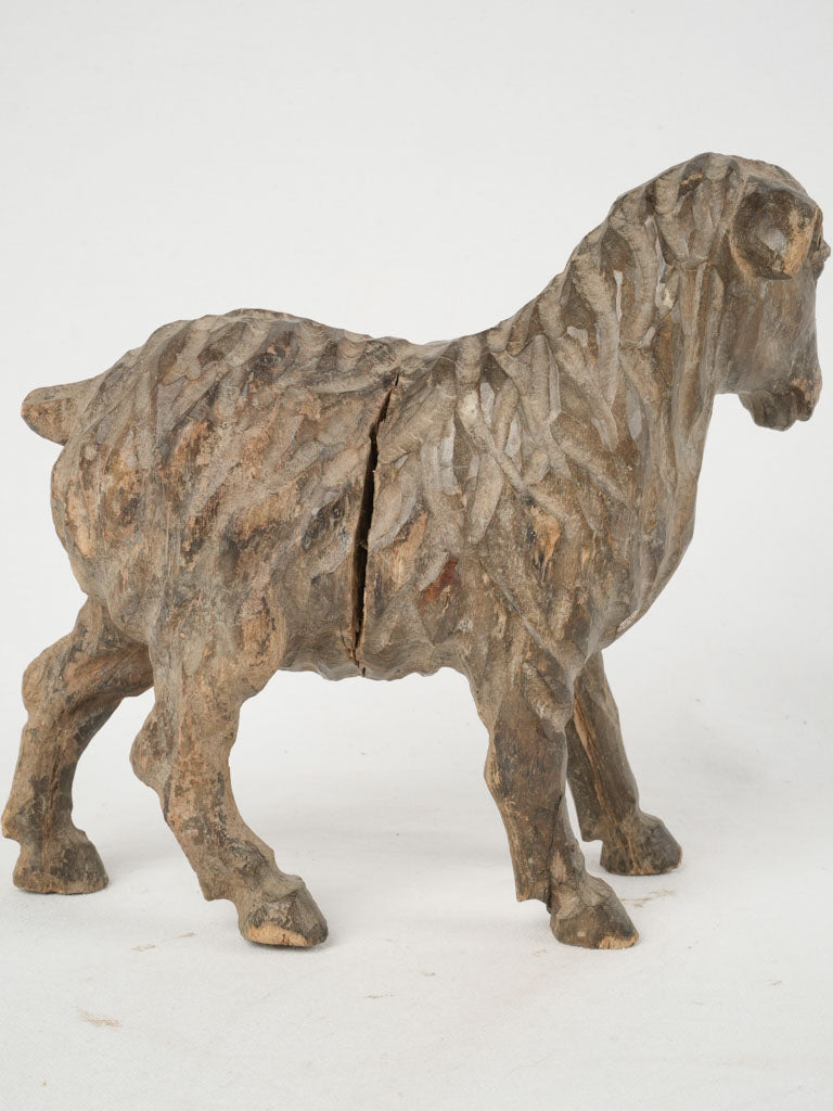 Endearing traditional wooden lamb figurine