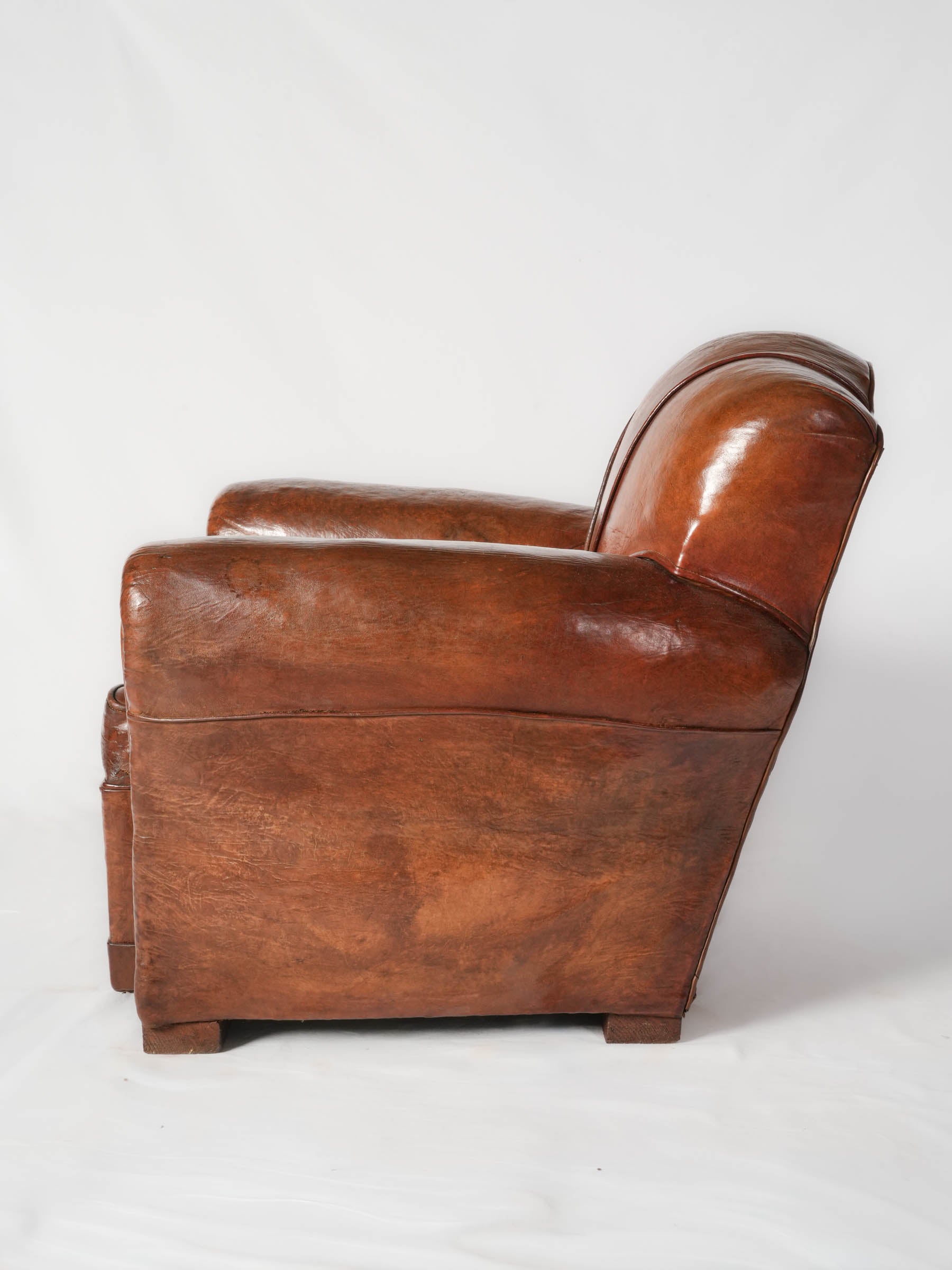 Mellowed cognac-brown leather armchair