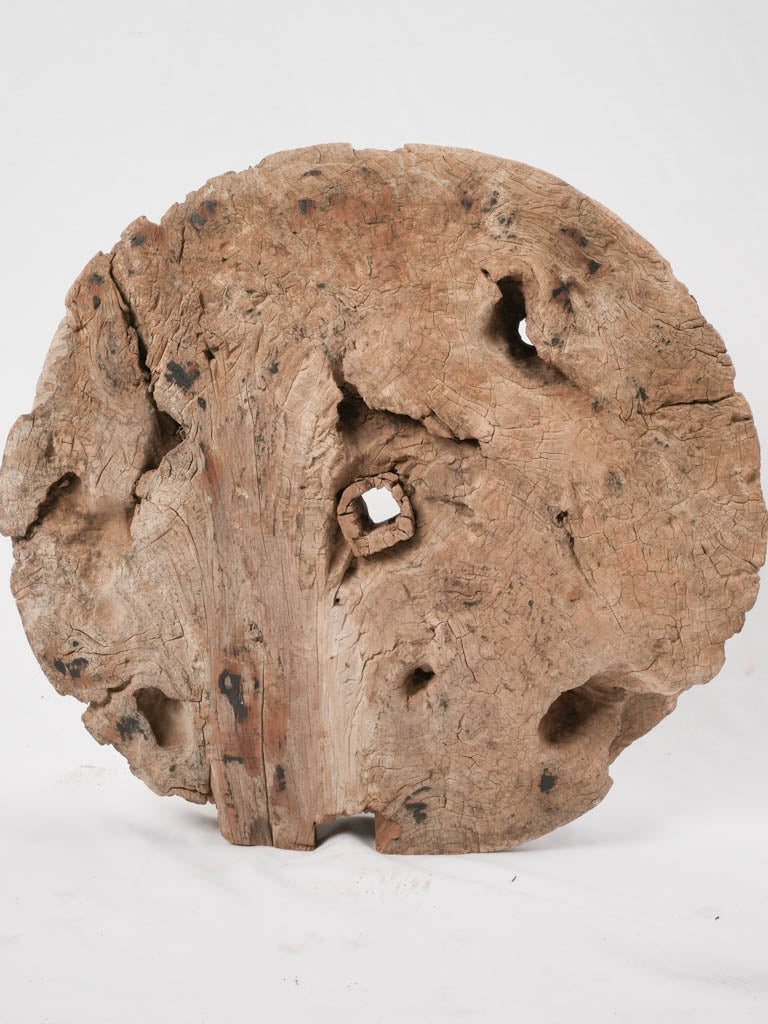 Rugged, charming well wheel relic