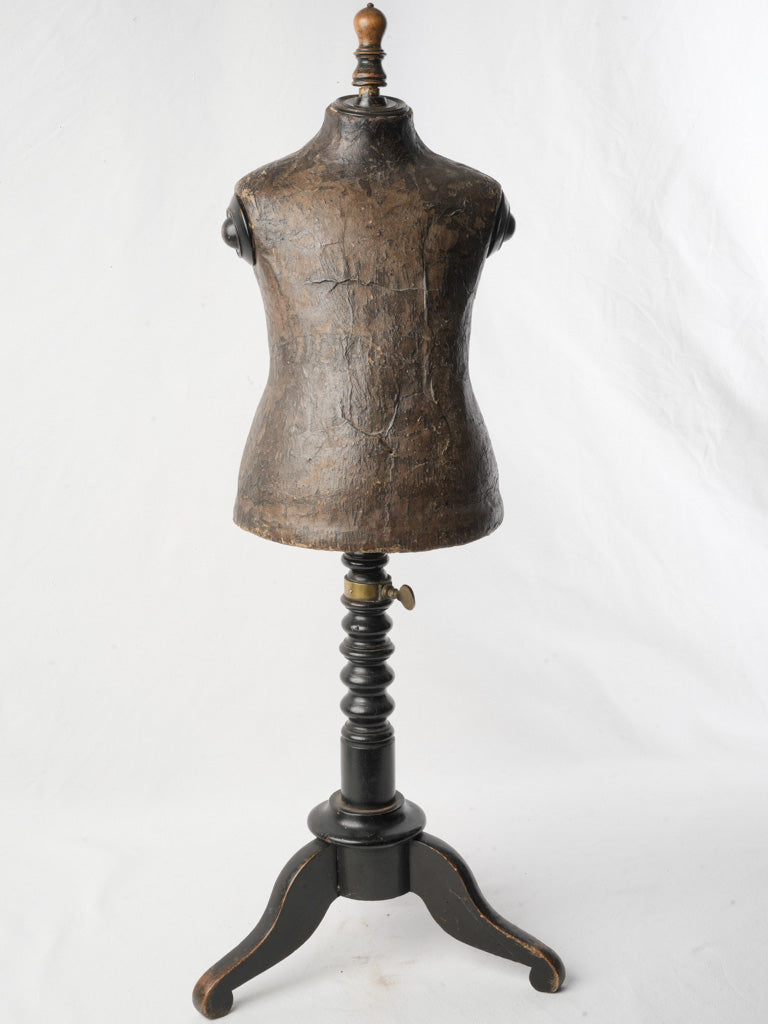 Antique leather-colored child mannequin