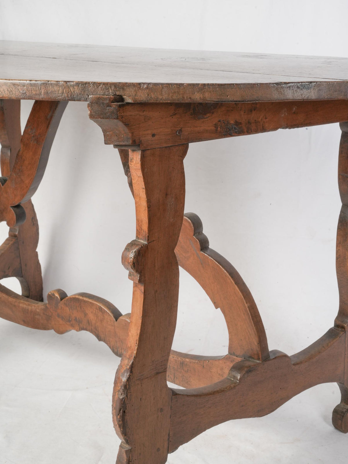 Timeless sculptural walnut center table