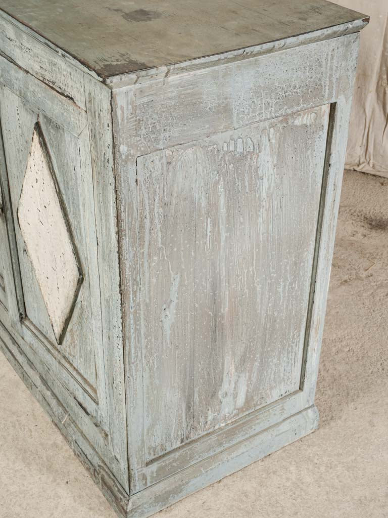 Textured diamond-paneled French cabinet