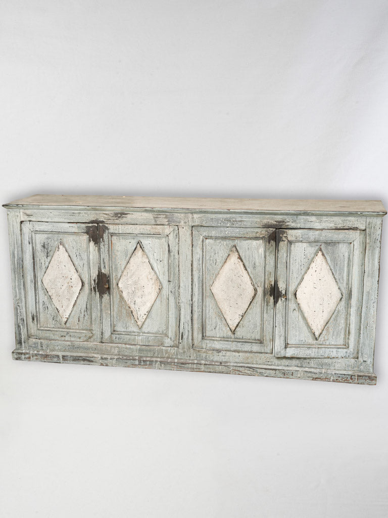 Aged sleek French shop cabinet