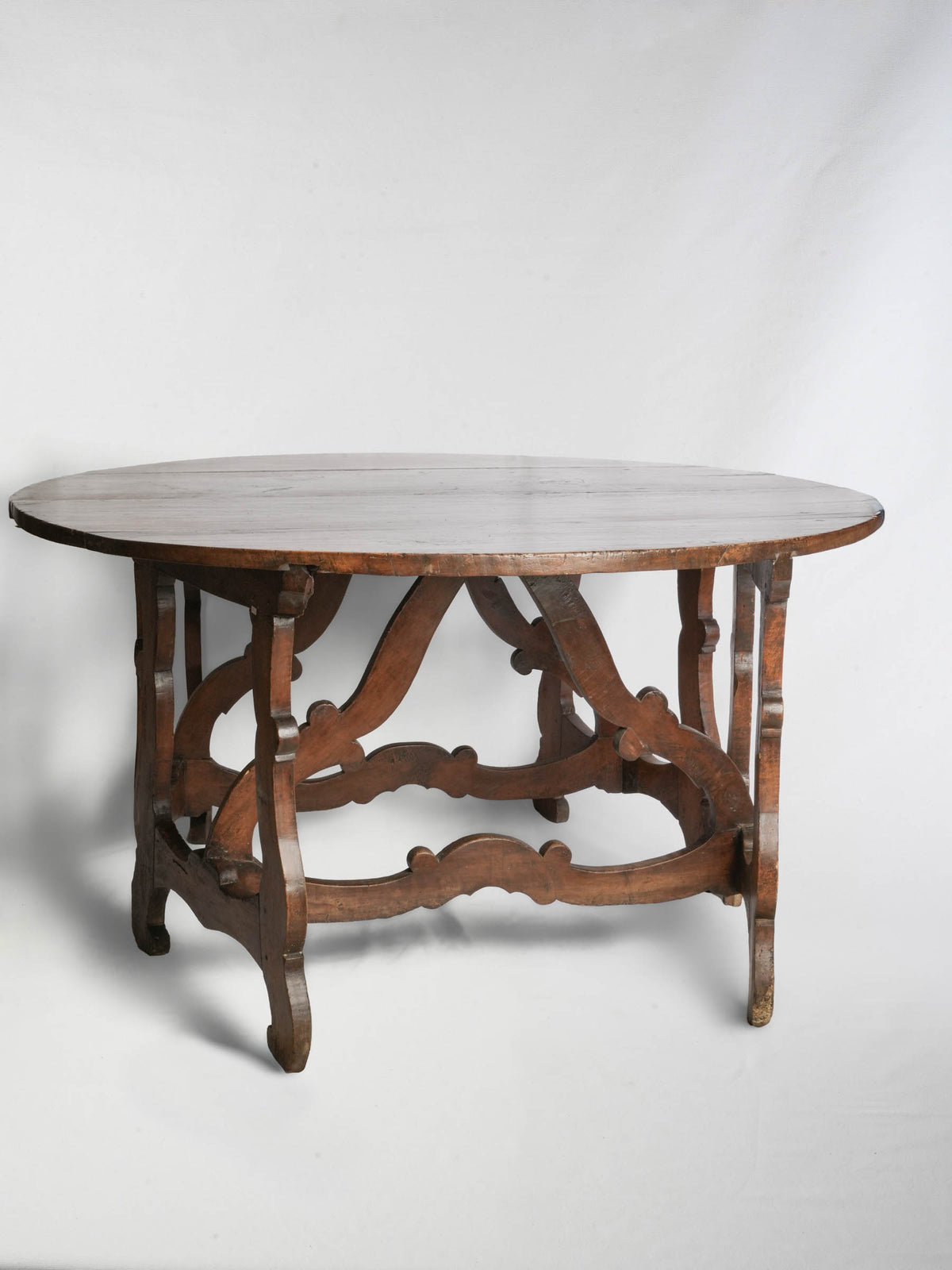 Mellow patina Italian center table