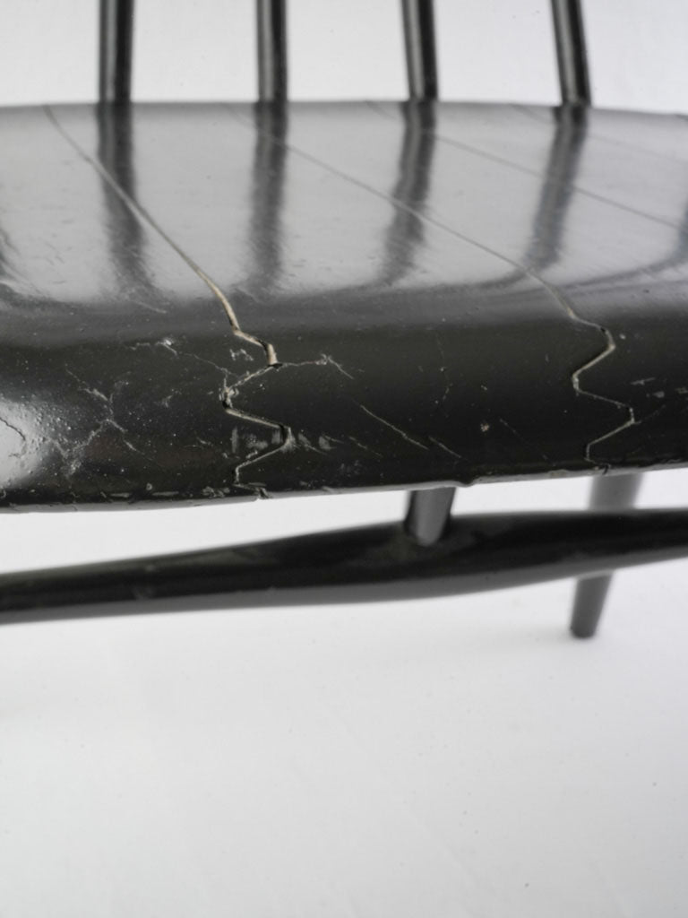 Timeless sculptural black wood chair