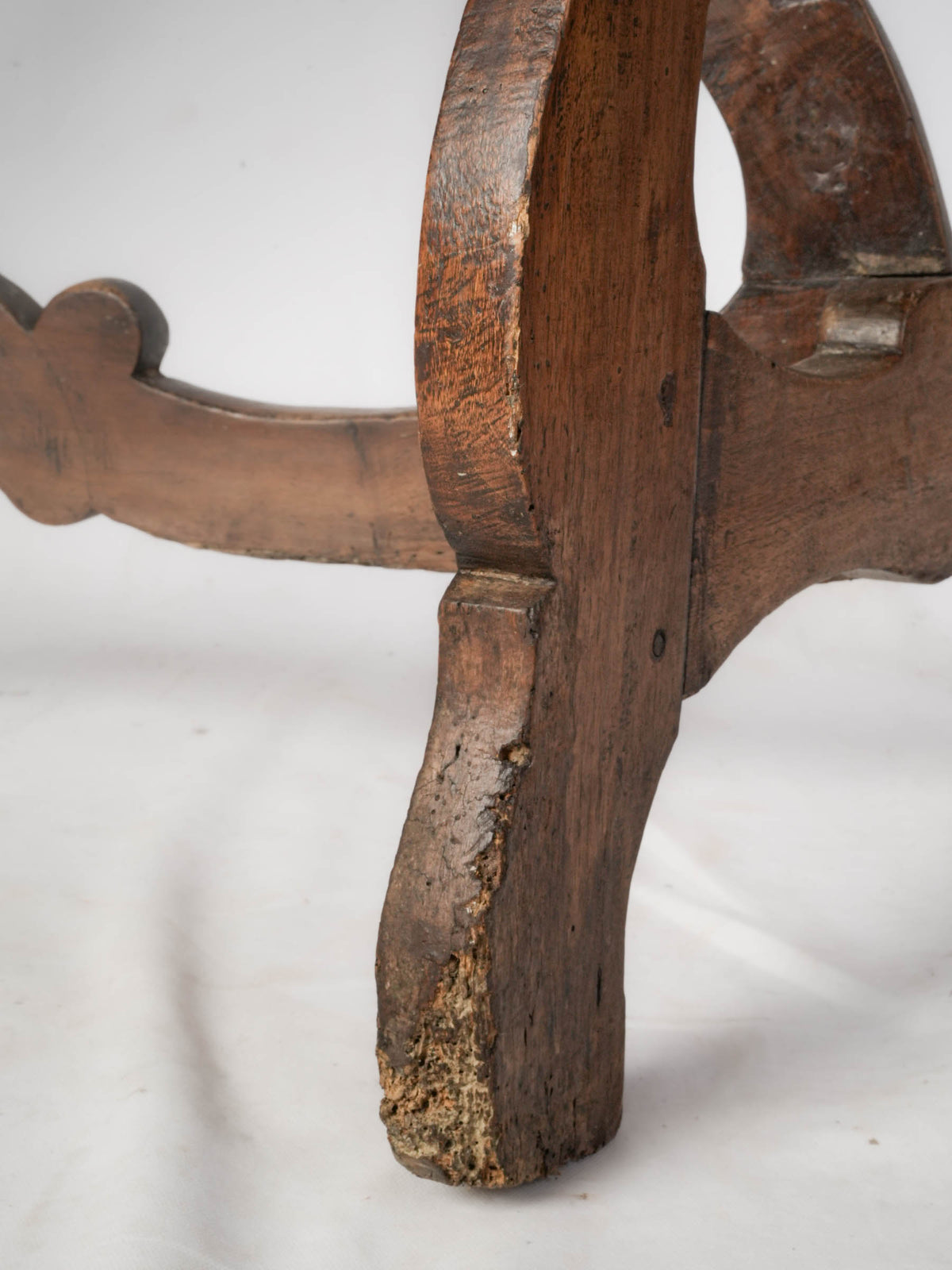 Symmetric walnut demilune consoles pair