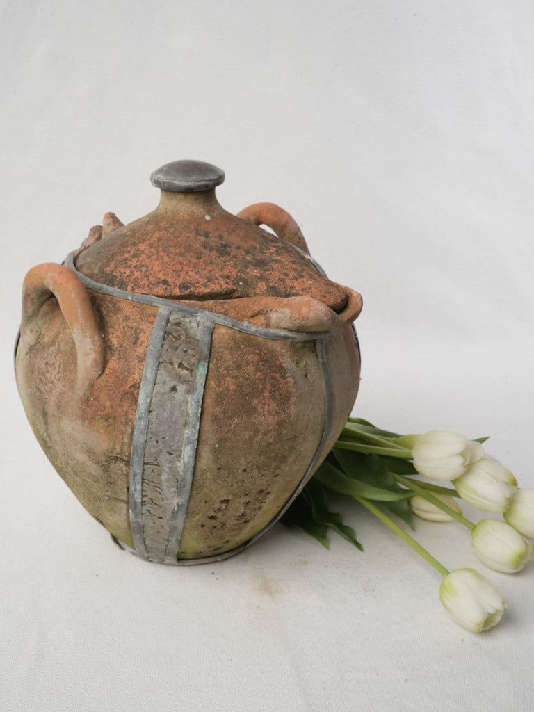Aged terracotta pottery vessel