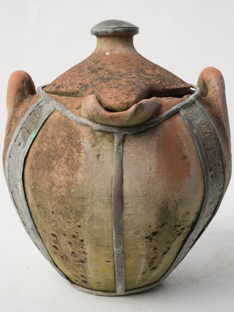 Rustic hand-thrown clay pot