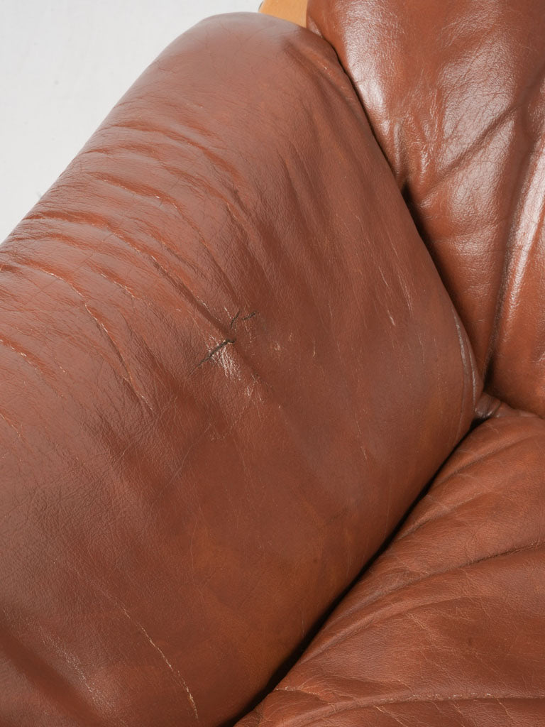 Comfortable brown leather armchairs