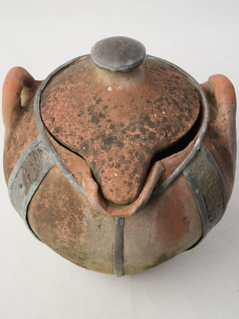 Textured metal-strapped jar