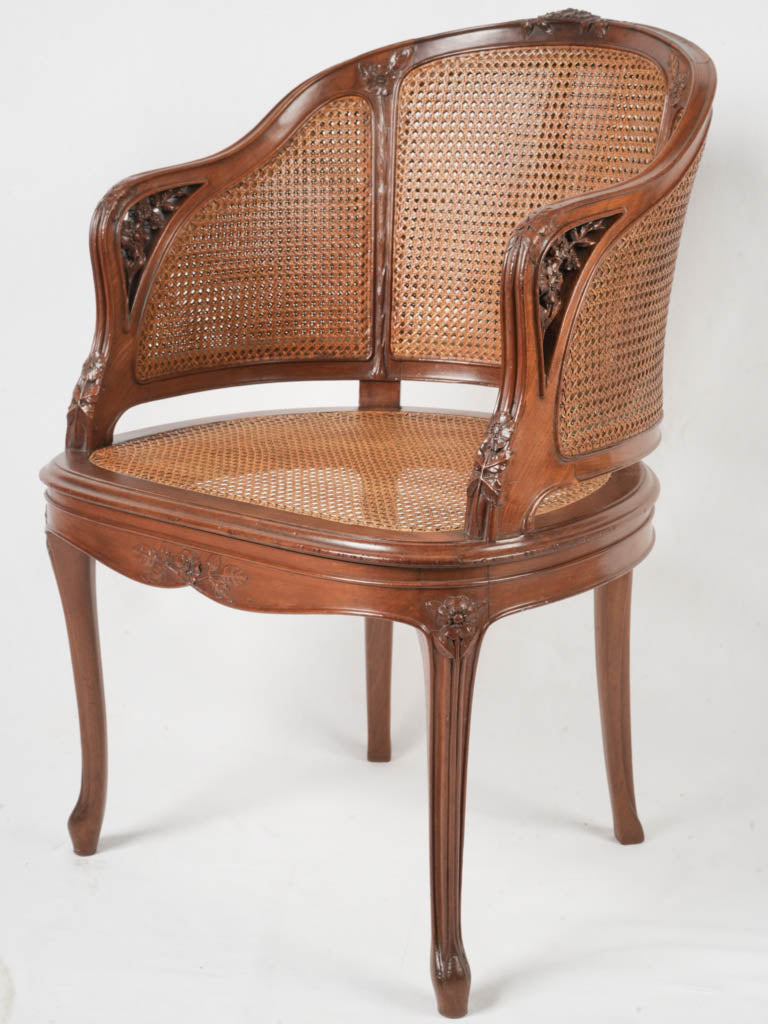 Exquisite vintage armchair with caning