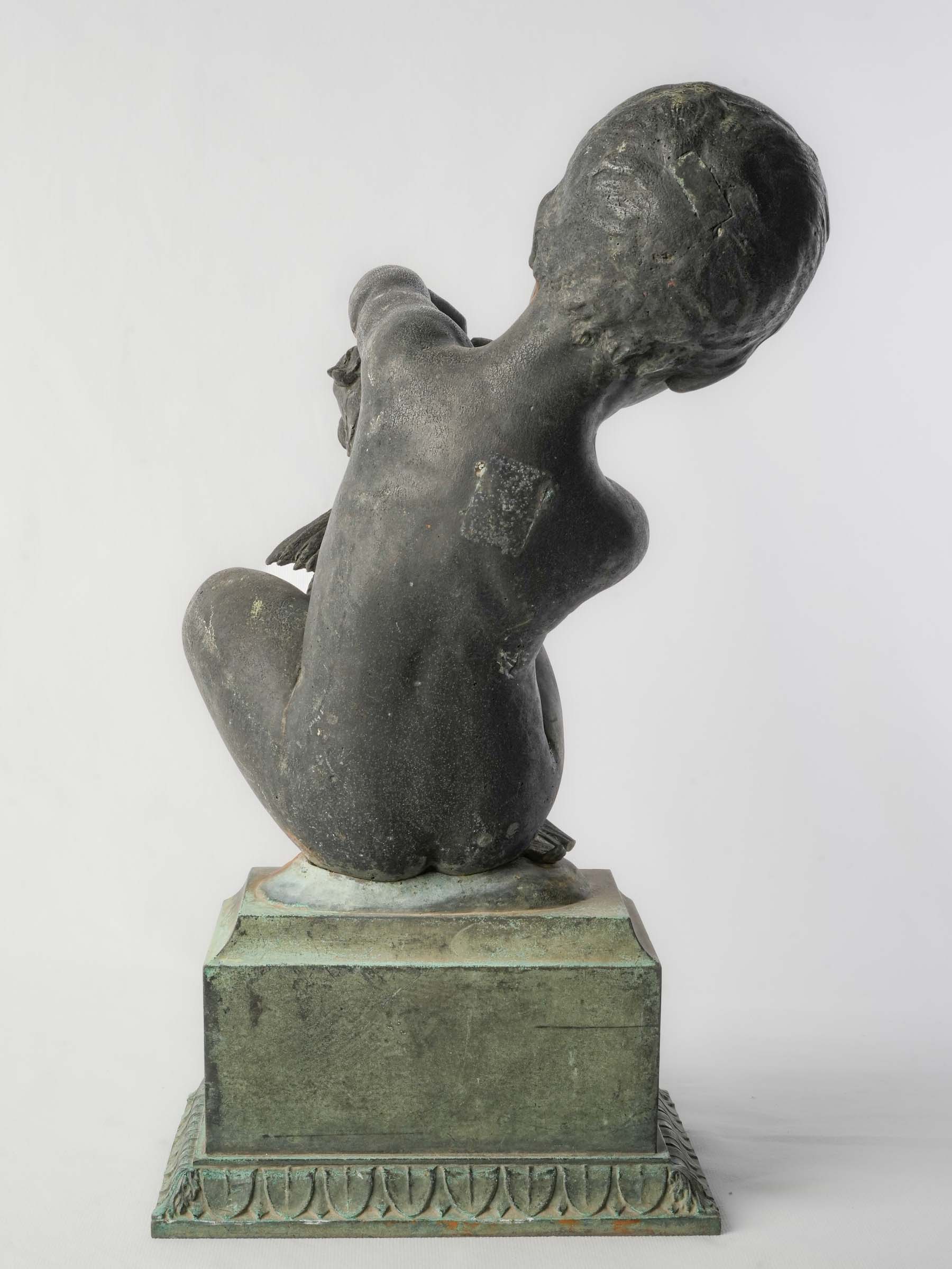 Whimsical baroque-style fountain figure