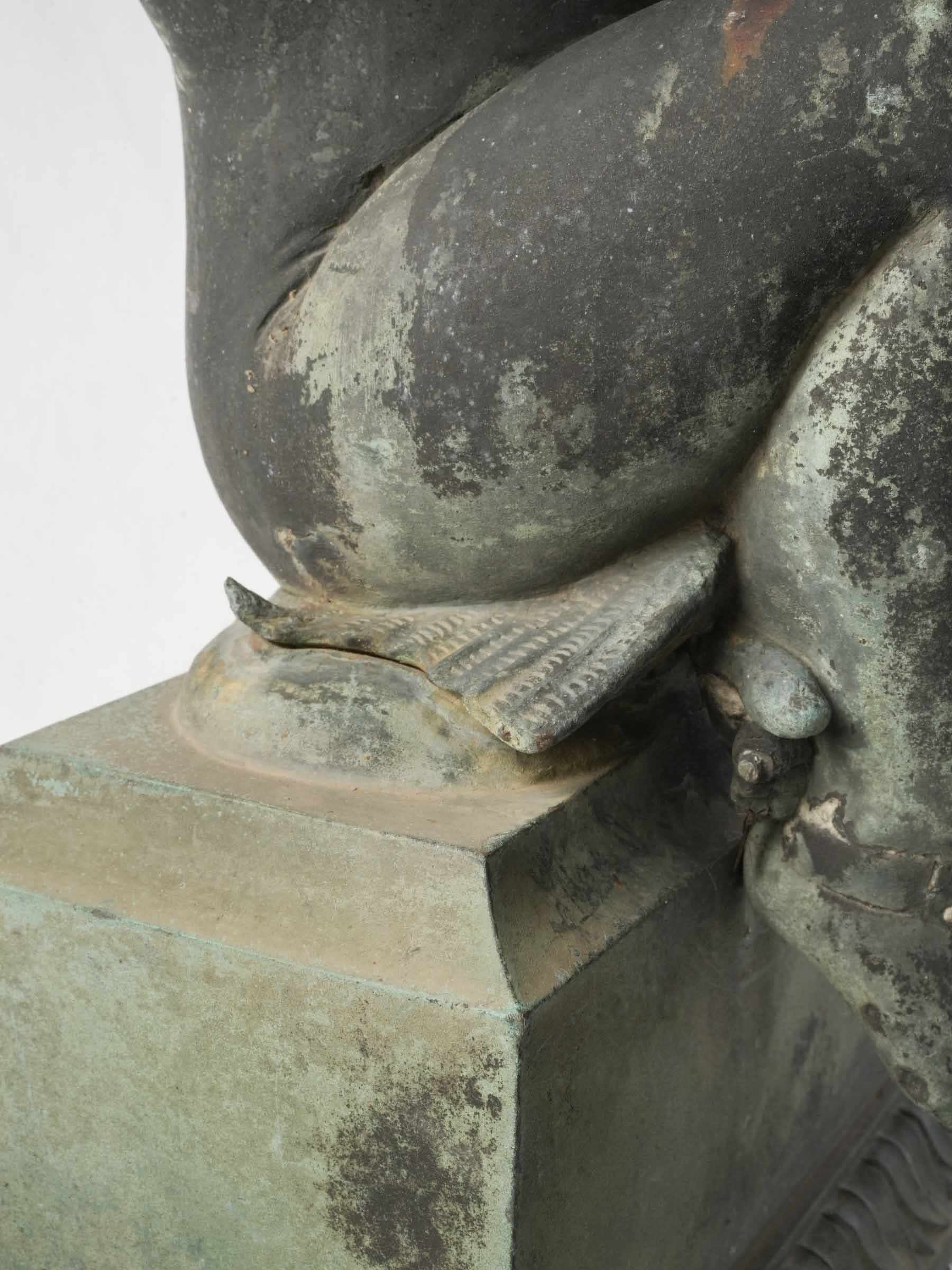 Detailed expressive dolphin basin statue