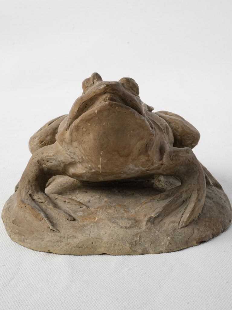 Charming handcrafted frog clay statue