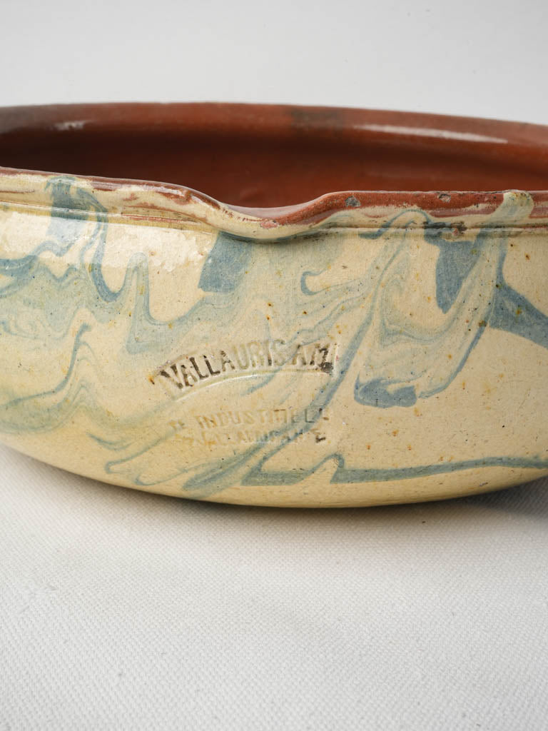 Heat-worn glazed artifact