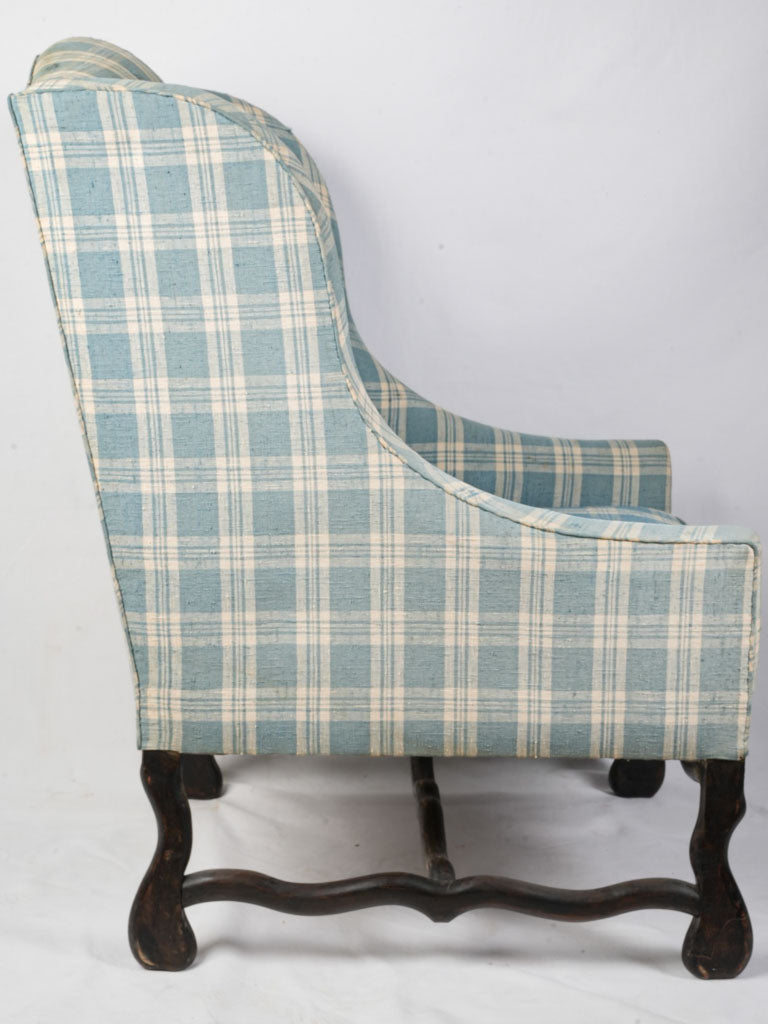 Classic country-style wingback armchair