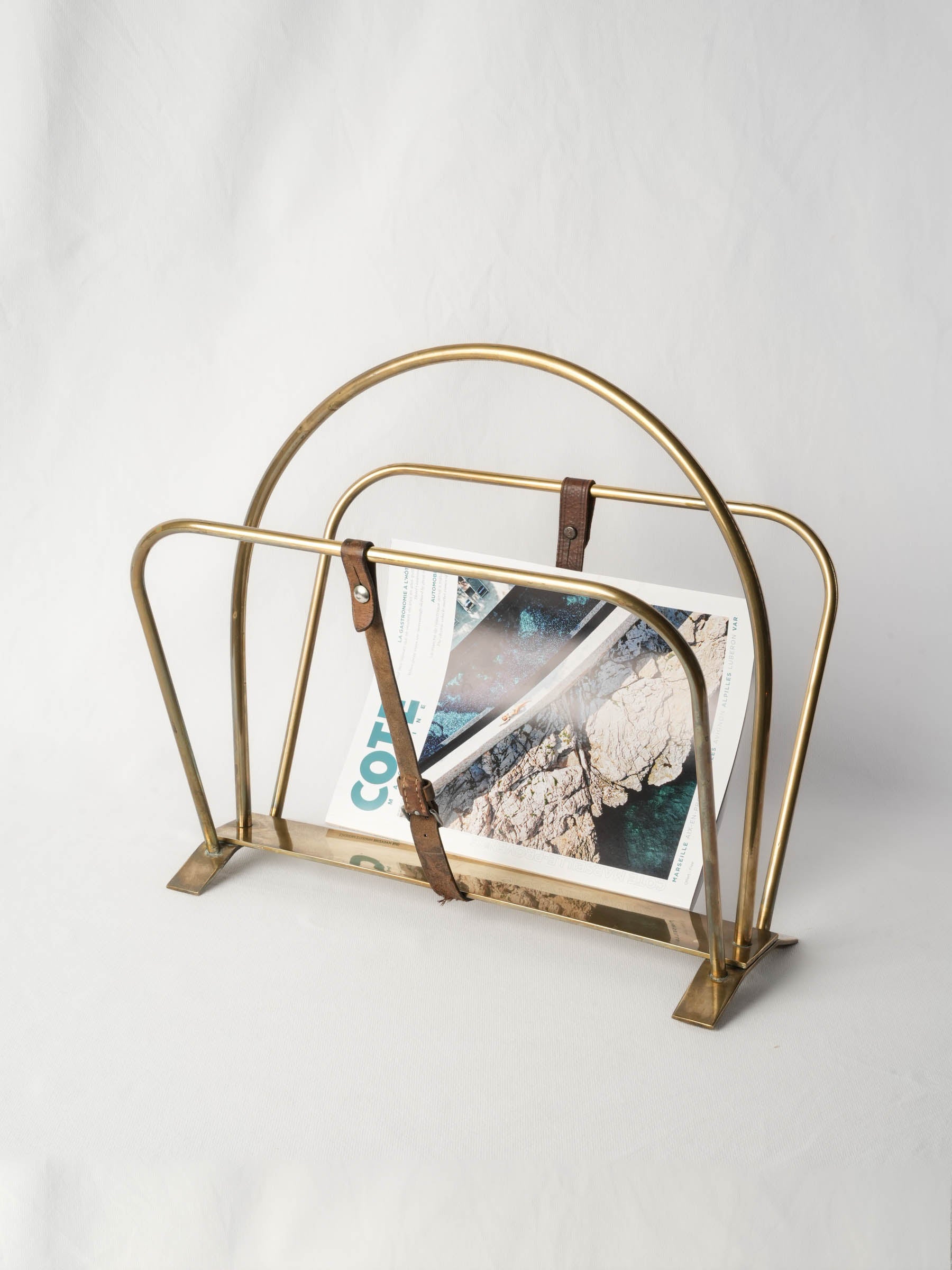Mid-Century Hollywood Regency Brass Magazine Rack with Buckled Leather Strap - 16½" x 17¾"