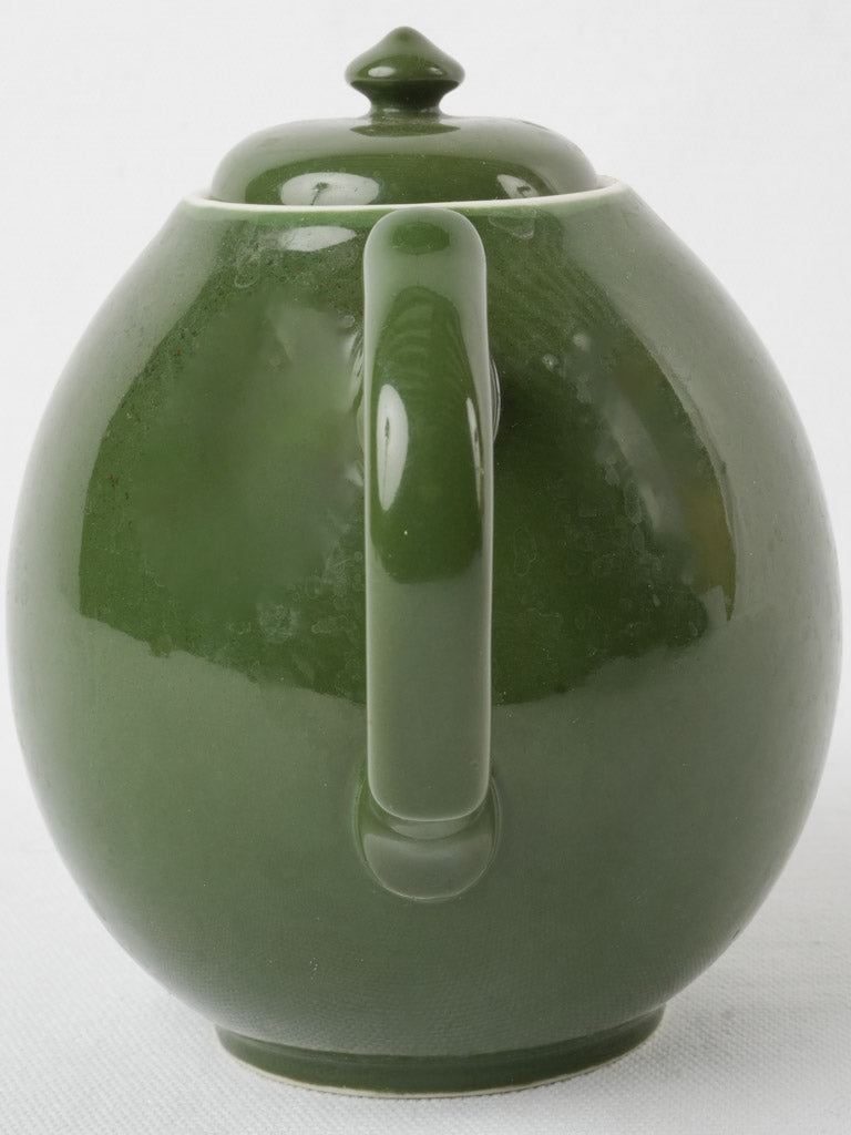 Charming aged green ceramic teapot