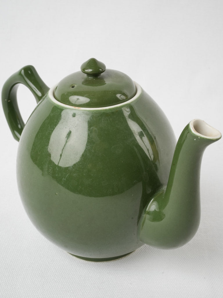 Retro ceramic teapot in green