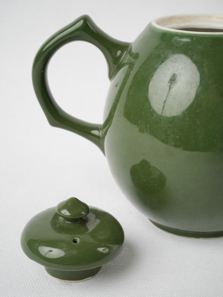 Dark green vintage teapot