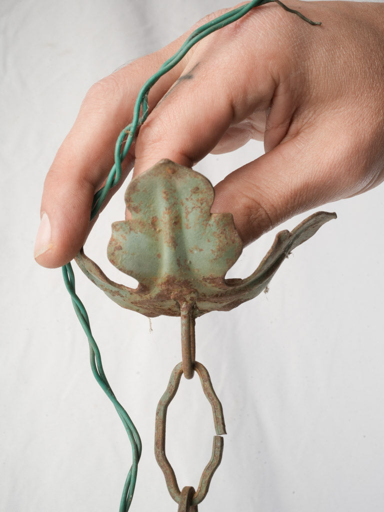 Decorative scrolling volutes lantern