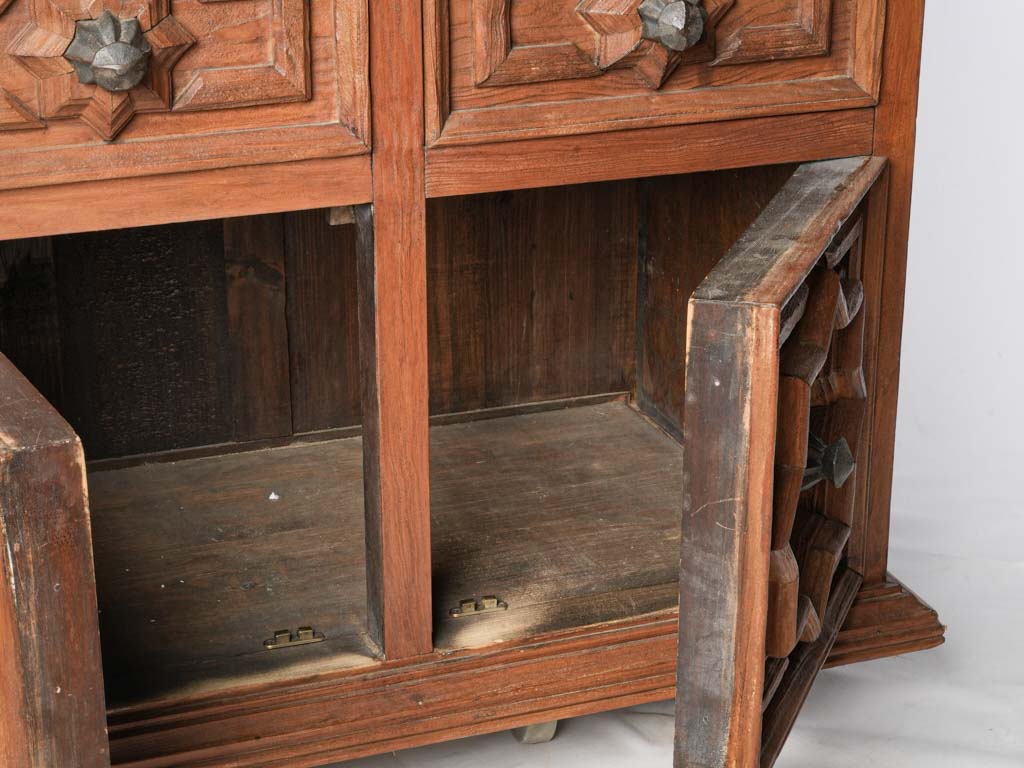 Intricately carved wood cabinet