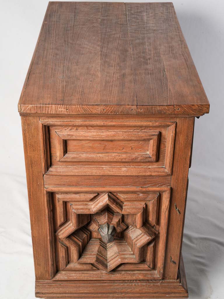 Metal handle adorned cabinet