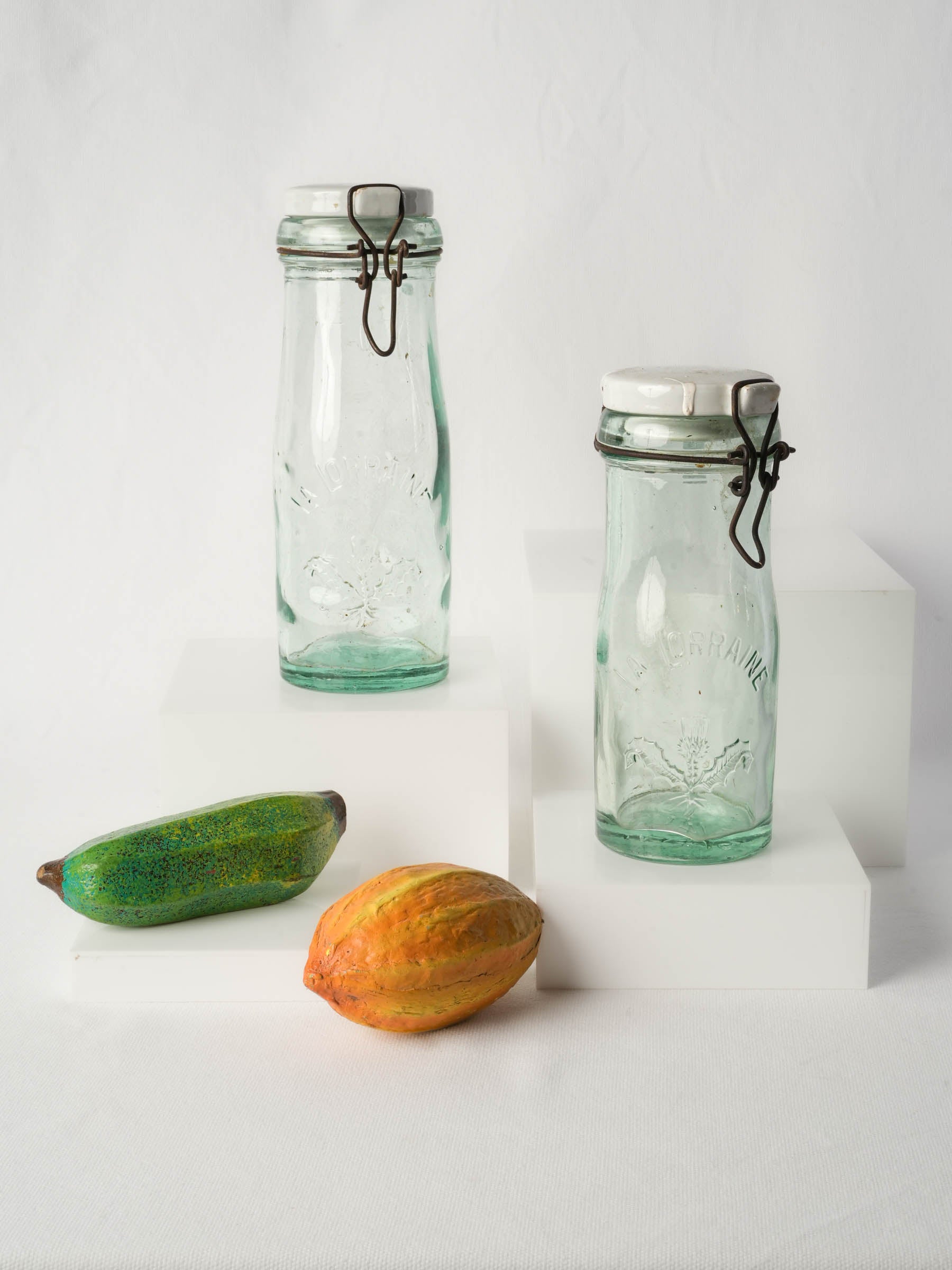 Graduated Pair of French "La Lorraine" Embossed Glass Preserving Bottles, 1930s–1950s - 10¾"