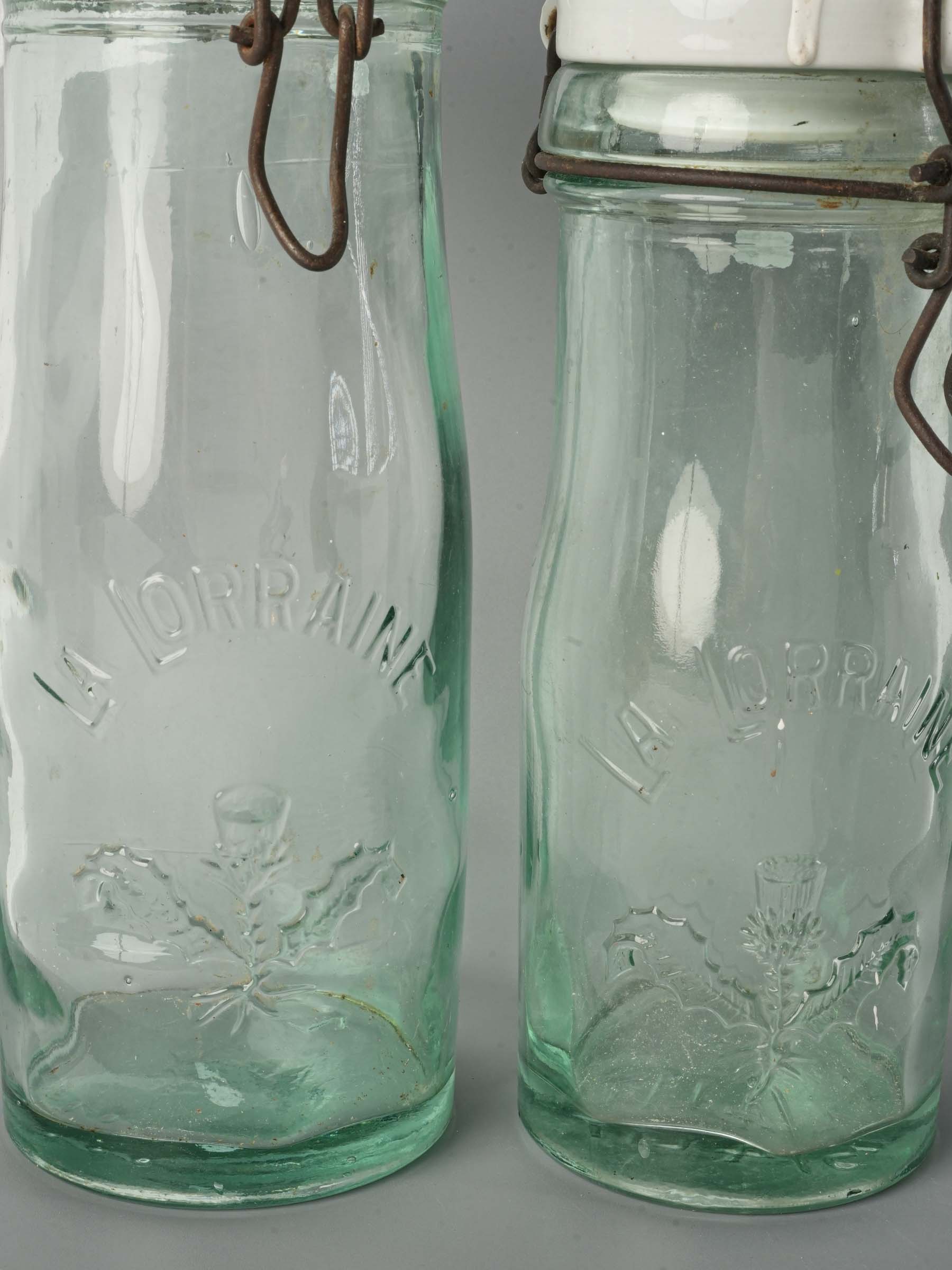 Graduated Pair of French "La Lorraine" Embossed Glass Preserving Bottles, 1930s–1950s - 10¾"