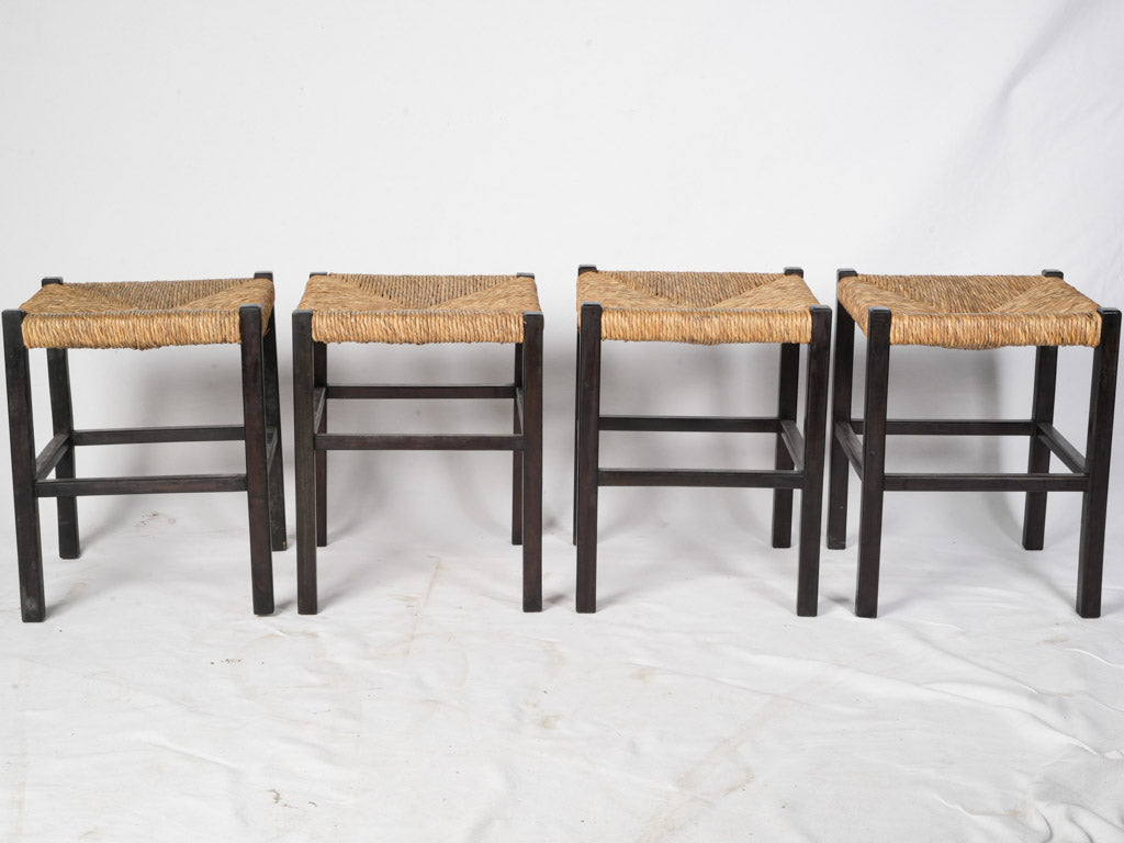 Patinated dark wood framed stools