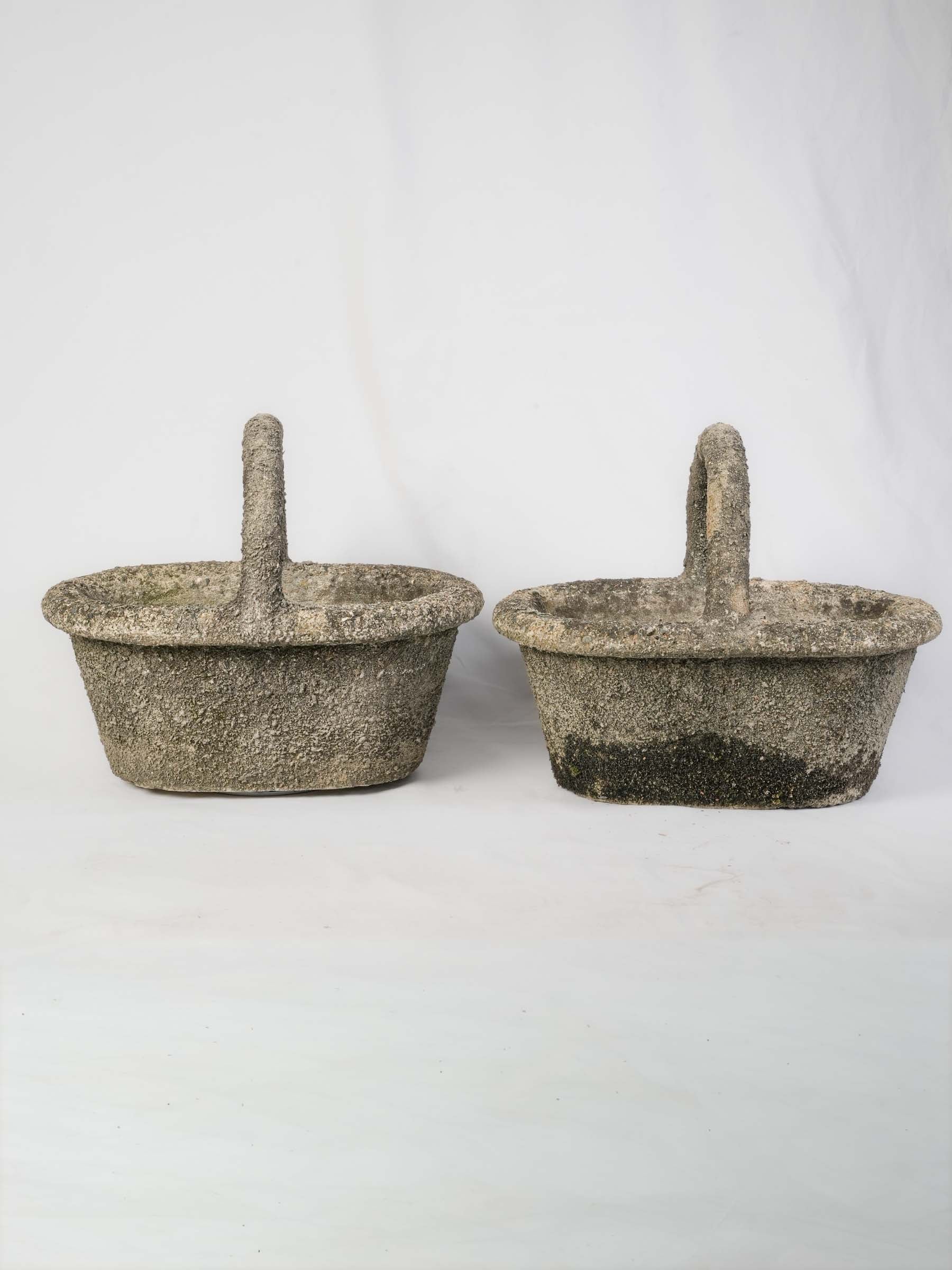 Moss-darkened vintage Provençal-style planters