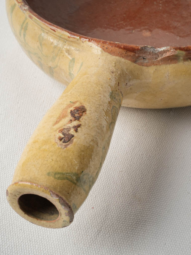 Decorative antique cooking vessel