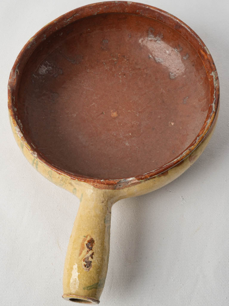 Authentically aged ceramic poêlon