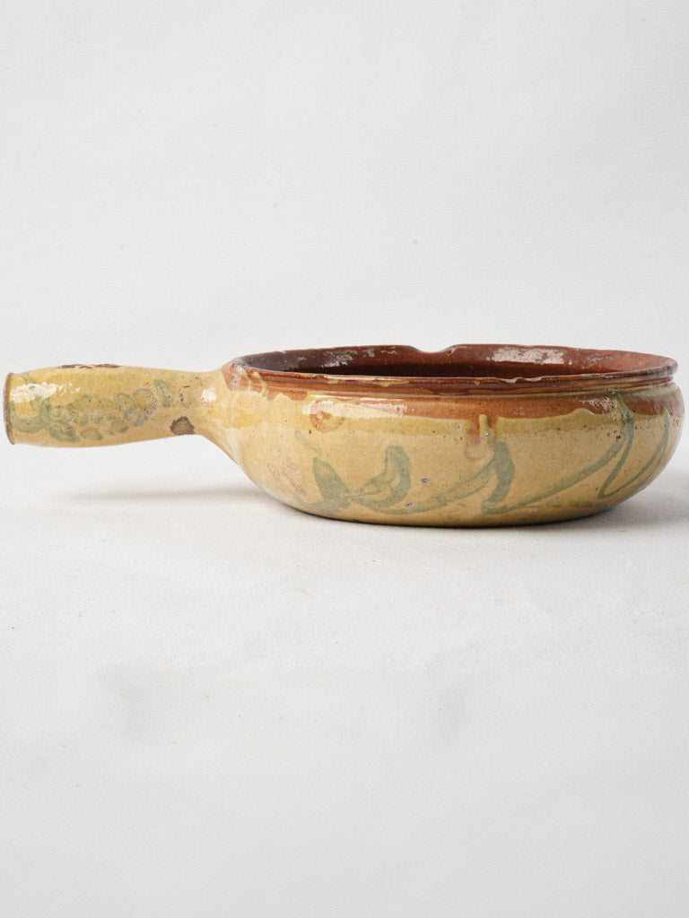 Worn clear-glazed pottery dish