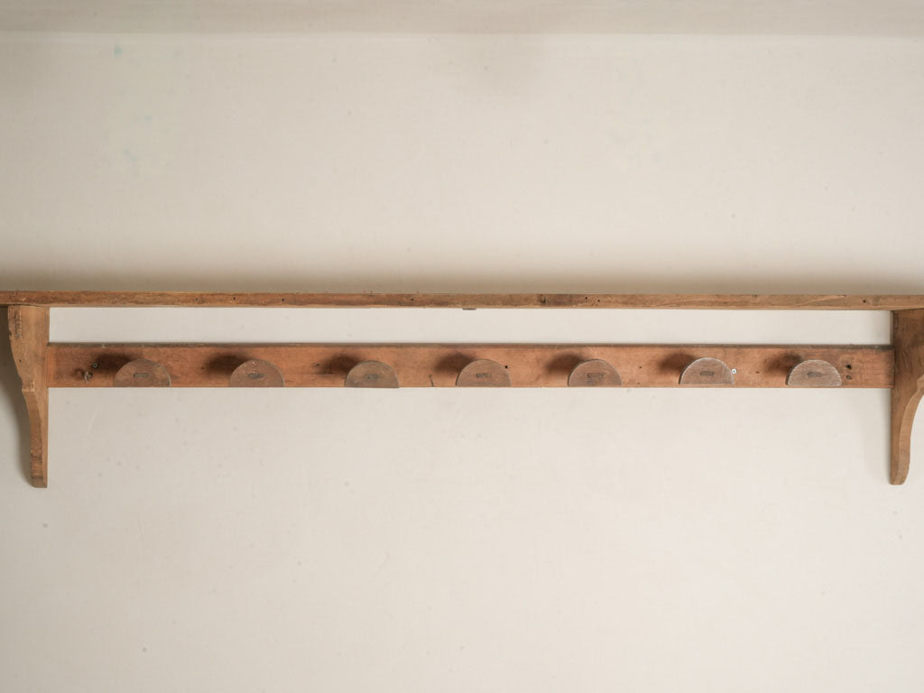 Rustic corbel-supported wall rack