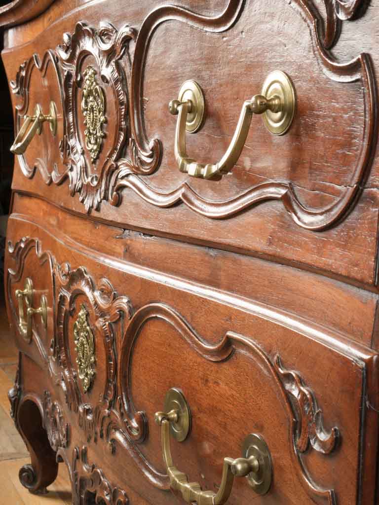 Charming escargot-footed walnut commode