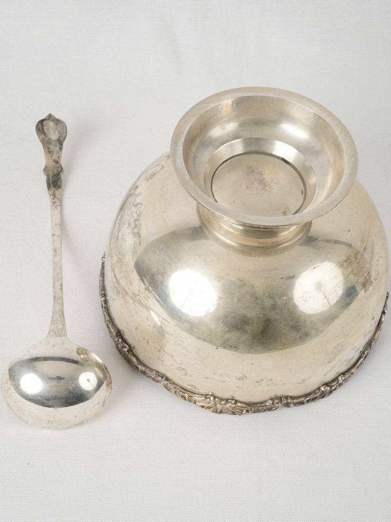 Ornate silver-plated cocktail service with ladle