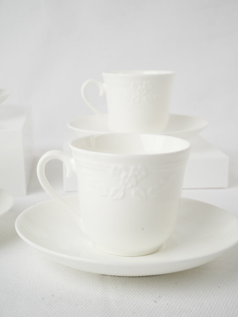 Contemporary white tea cups and saucers.