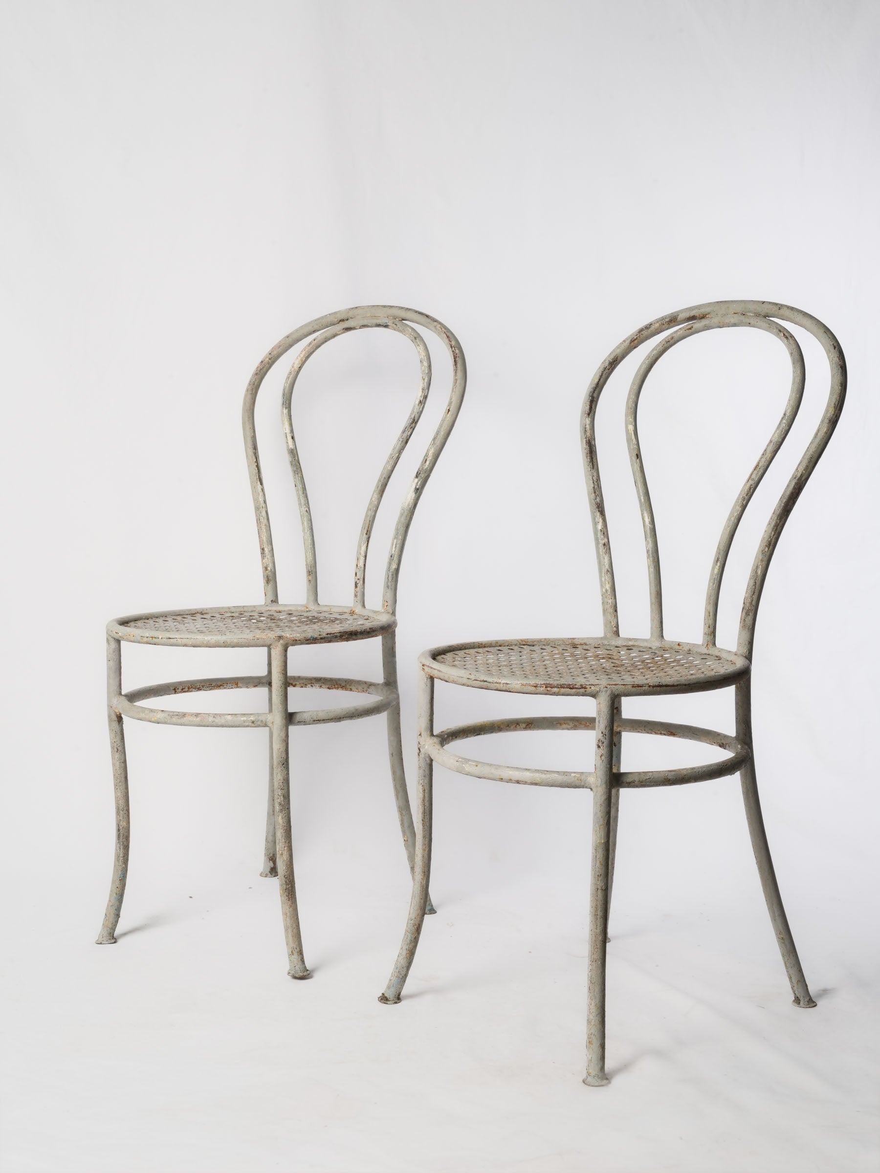 Antique metal bistro chairs set