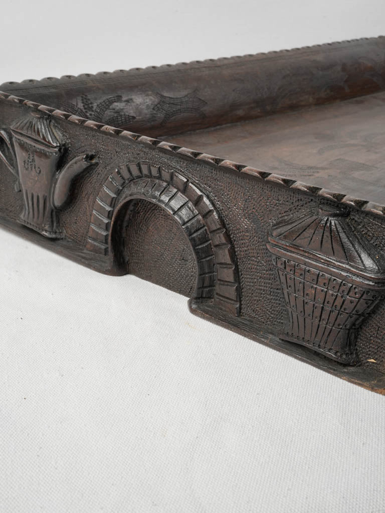 Intricately carved symbolic tray