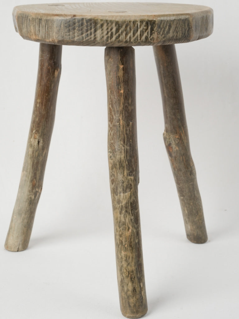 Aged country-style wooden pull-up stool