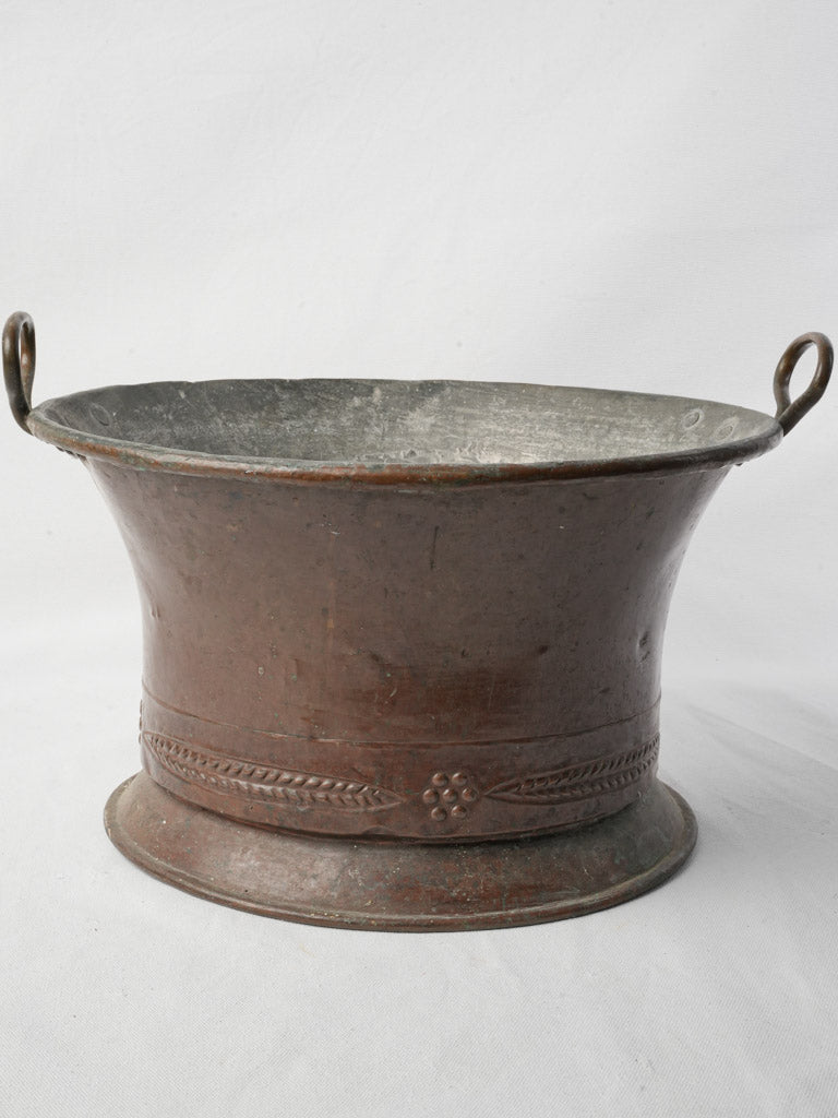 Traditional riveted copper pot