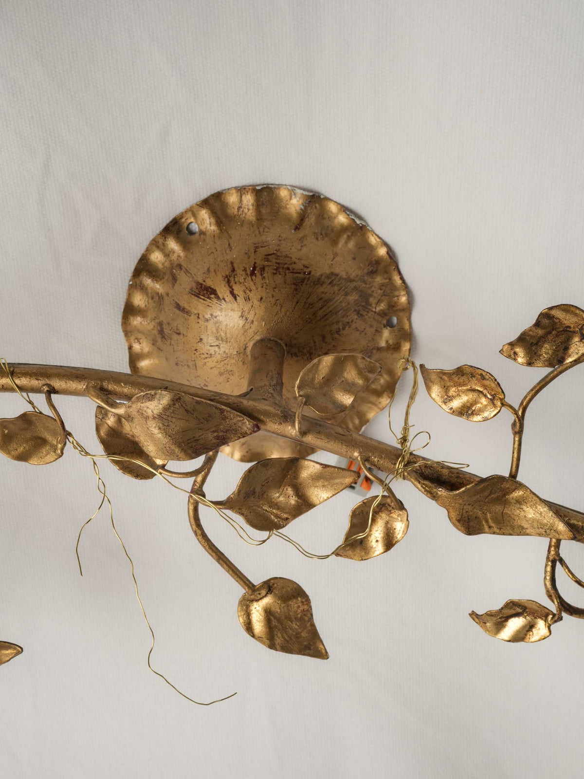 Handcrafted naturalistic gold sconces